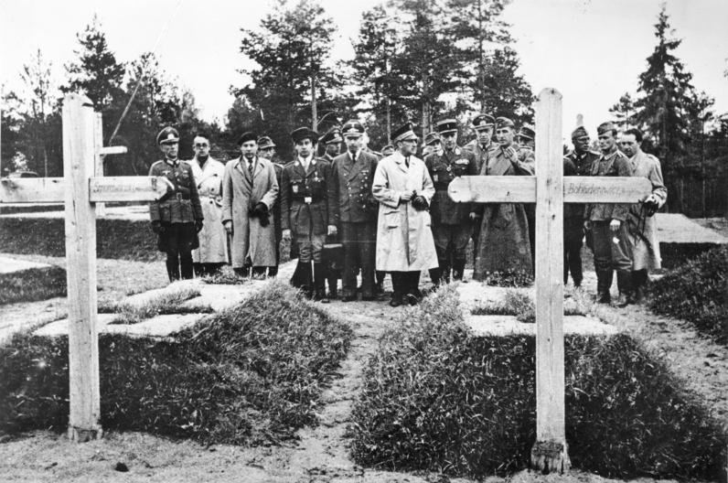 French Ambassador Fernand de Brinon visits the place of the mass murder in the forest of Katyn accompanied by German officers. April 1943.